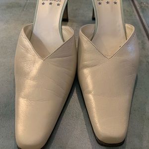 Sage green heels labeled as size 40